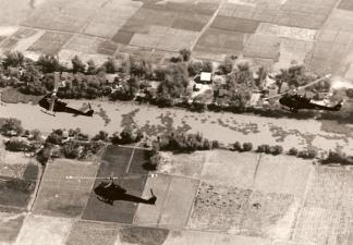 Three Seawolf helicopter gunships on a search and destroy mission above the Uminh Forest in the Mekong Delta.